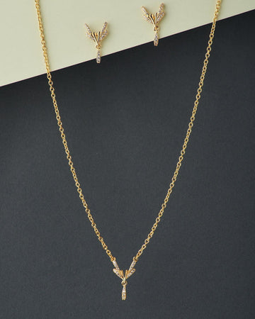 A cute pendant matched with golden polish chain with matching earrings. - Chandrani Pearls