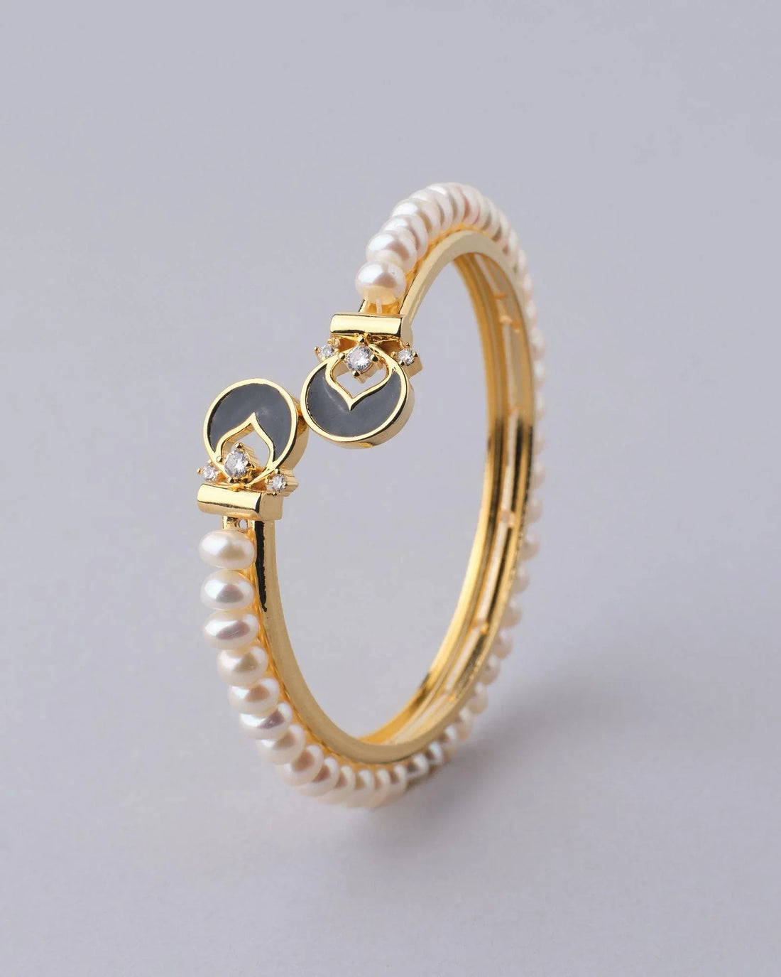 Fashionable Stone Studded Pearl Bangle - Chandrani Pearls