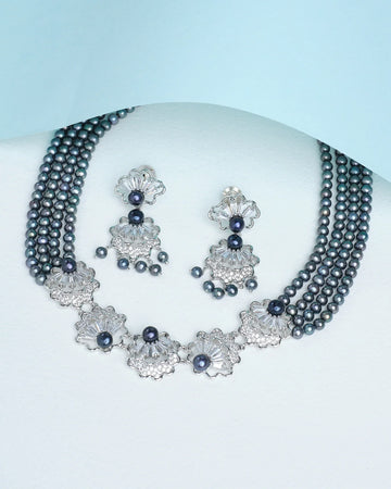 Elevate your style with this beautiful blend of pearls and CZ sparkle