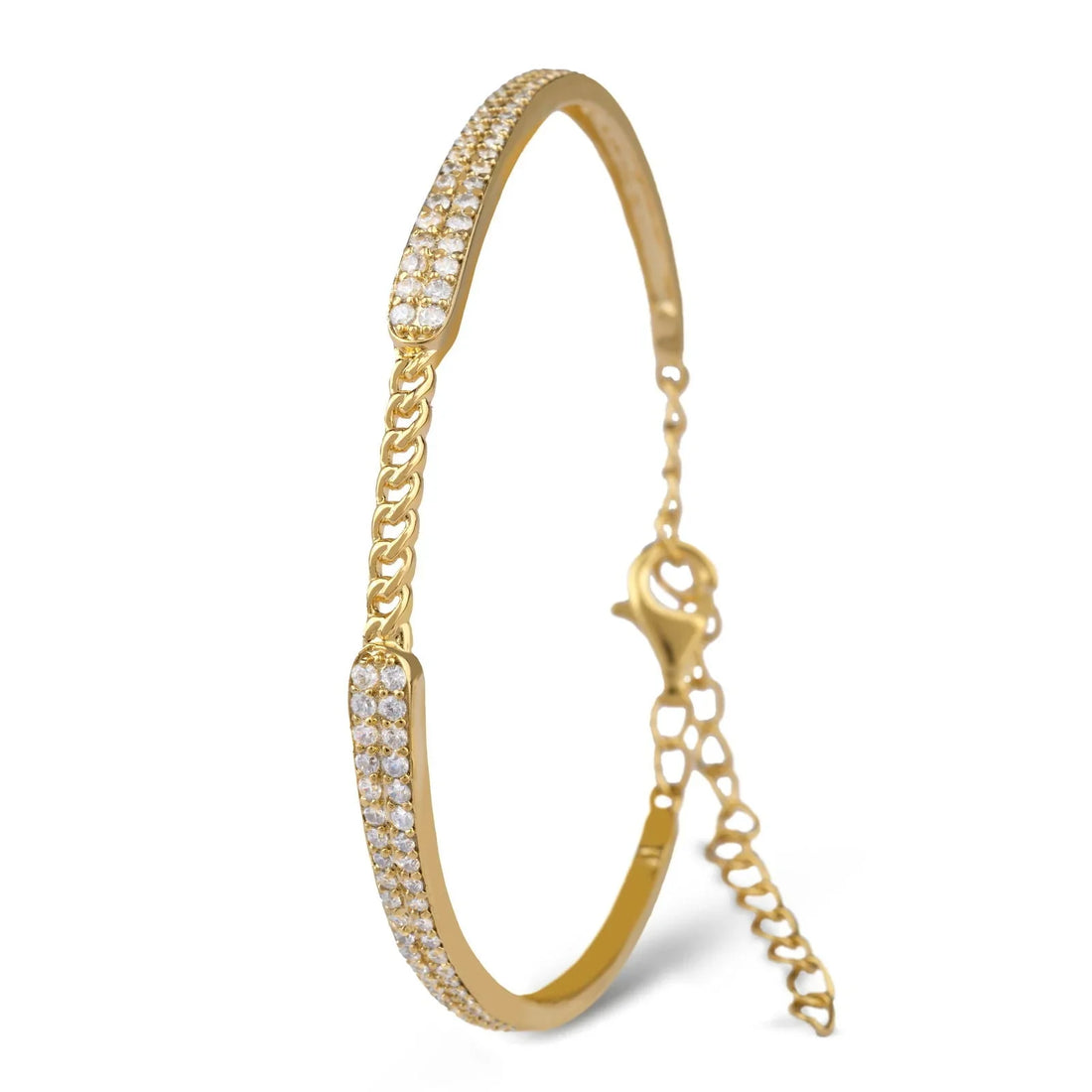 A close-up of a hand resting on a shoulder, adorned with the Chandrani Pearls Starry Night Bangle in 18K gold—a thin bracelet studded with delicate diamonds—radiating celestial elegance against a black background.