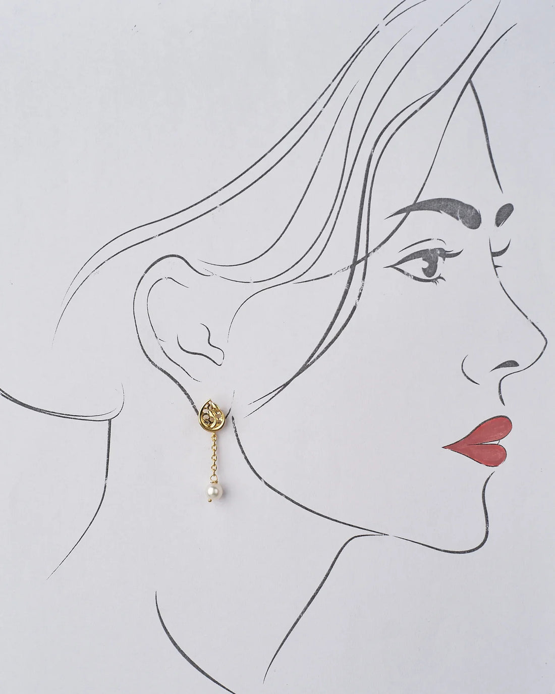 Tulipia 925 Silver Earrings by Chandrani Pearls with pearl drops in front of a red textured backdrop, paired with a red rose.