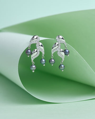 Beautiful and trendy, this pearl and CZ set adds sparkle and style to any look