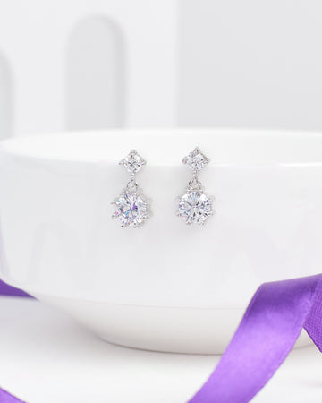 The Elegant Demifine Silver Earrings with Sparkling CZ Stones from Chandrani Pearls offer a refined touch, their shimmering CZ accents adding brilliance to any look.