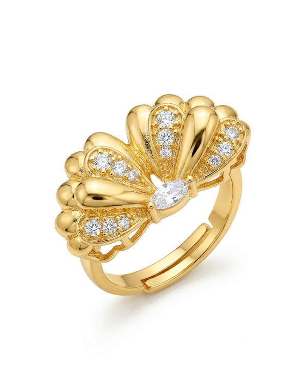 Gold ring with diamond accents on a white background