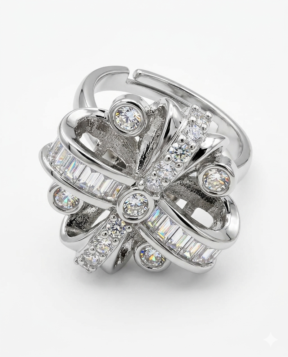 Silver ring with diamond accents on a white background