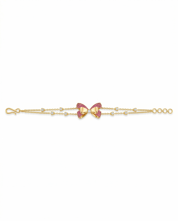 Gold bracelet with a bow-shaped clasp on a white background