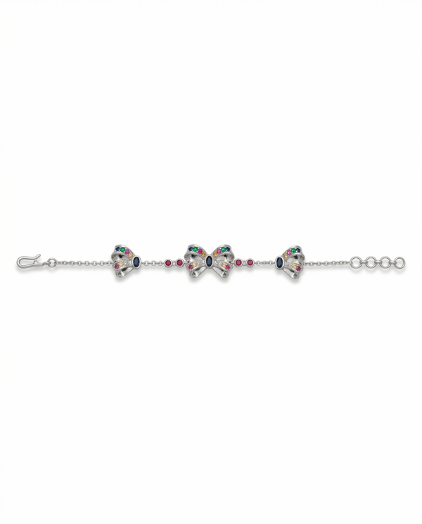 Silver bracelet with heart-shaped charms on a white background