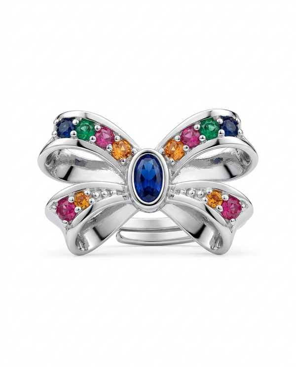 Silver butterfly ring with colorful gemstones on a white background