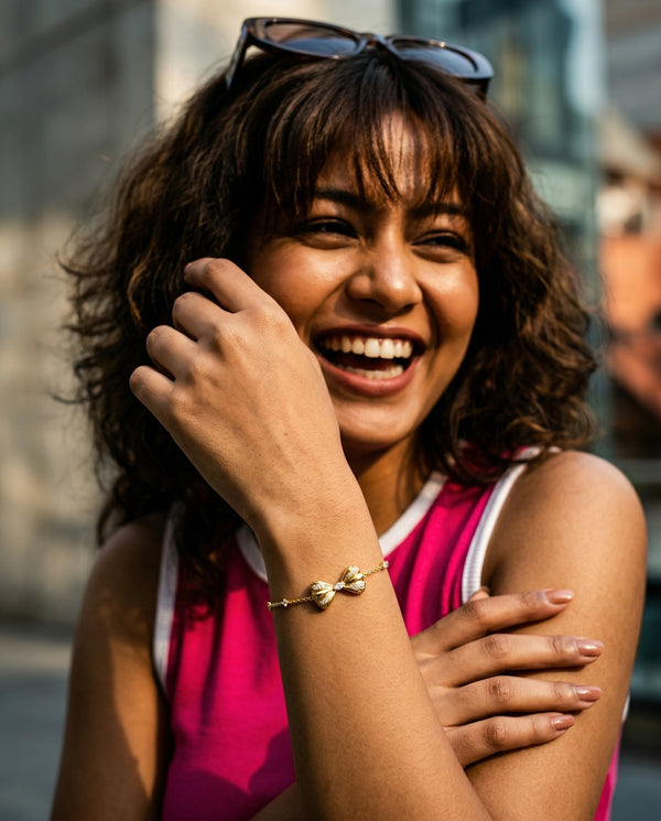 Woman with sunglasses on head, smiling outdoors