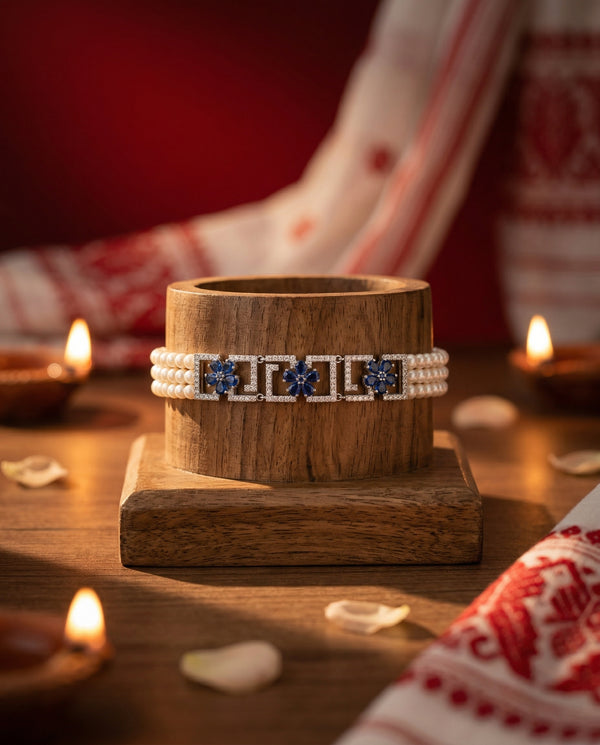 Elegant Triple-Strand Floral Pearl Bracelet