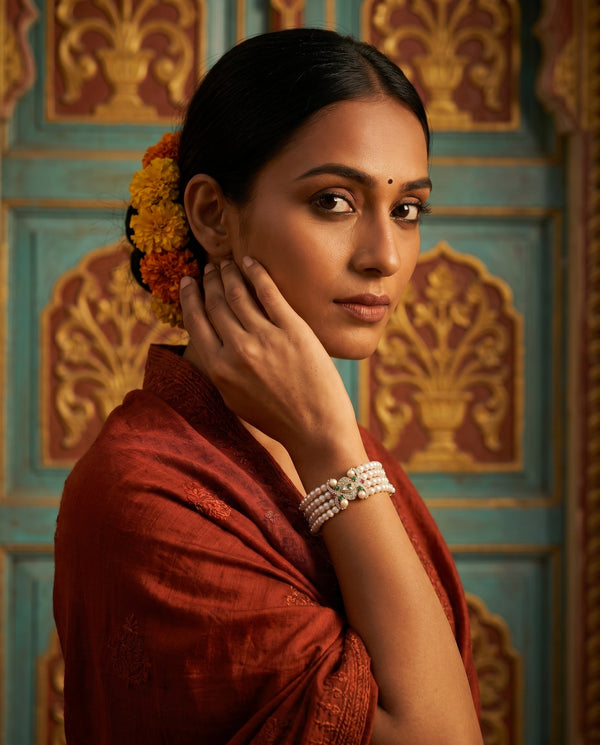 Elegant Multi Row Pearl Bracelet with Kundan Accents