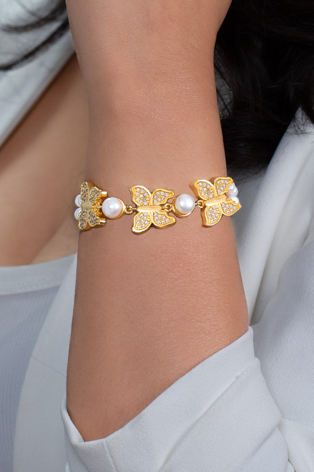 White Pearl Bracelet with Gold Finish Butterfly Motifs