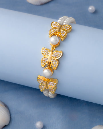 White Pearl Bracelet with Gold Finish Butterfly Motifs