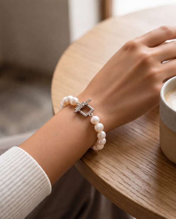 Lustrous Pearl Strand Bracelet with Silver Geometric Toggle Clasp