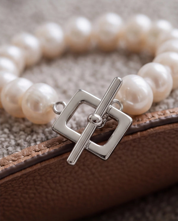 Lustrous Pearl Strand Bracelet with Silver Geometric Toggle Clasp