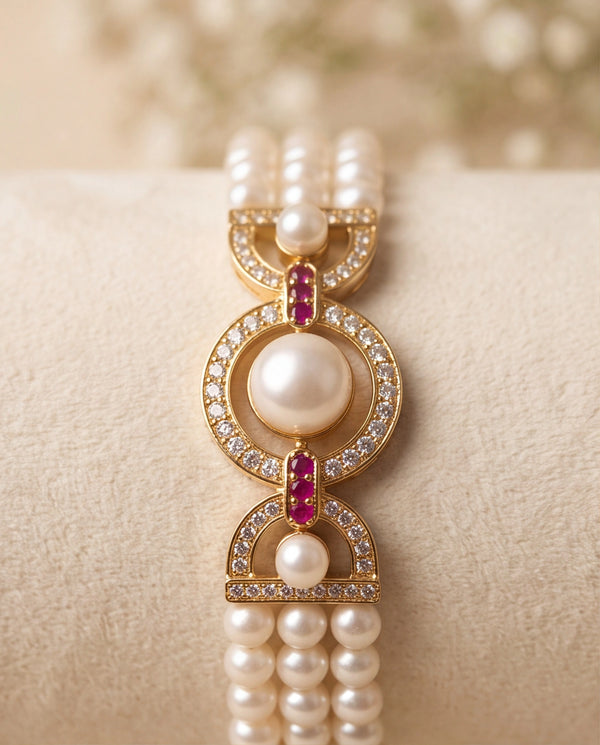 Three-Strand Pearl Bracelet with Circular CZ Centerpiece & Ruby Accents
