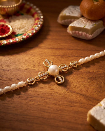 Pearl & CZ Clover Motif Gold-Plated Rakhi cum Bracelet