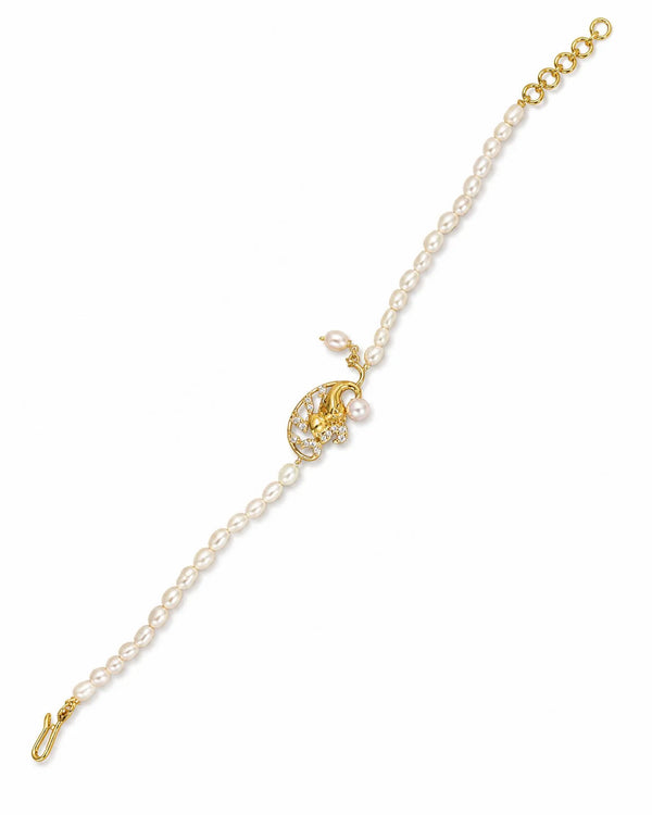Gold-Plated Lord Ganesha Pearl Rakhi Cum Bracelet