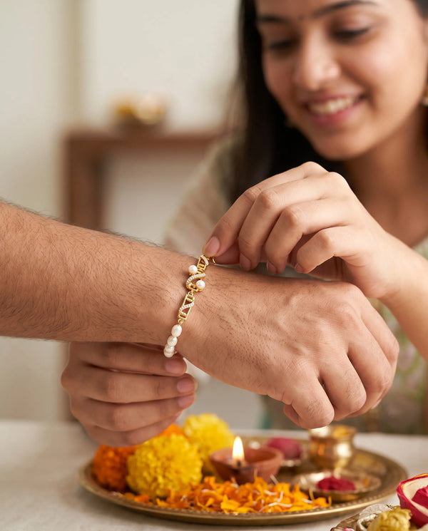 Gold-Plated Geometric Pearl & Cubic Zirconia Rakhi Cum Bracelet