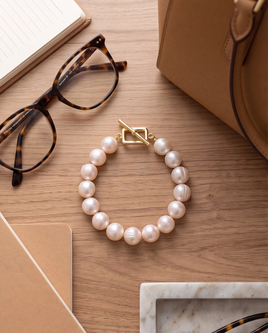 Lustrous Pearl Strand Bracelet with Gold Geometric Toggle Clasp