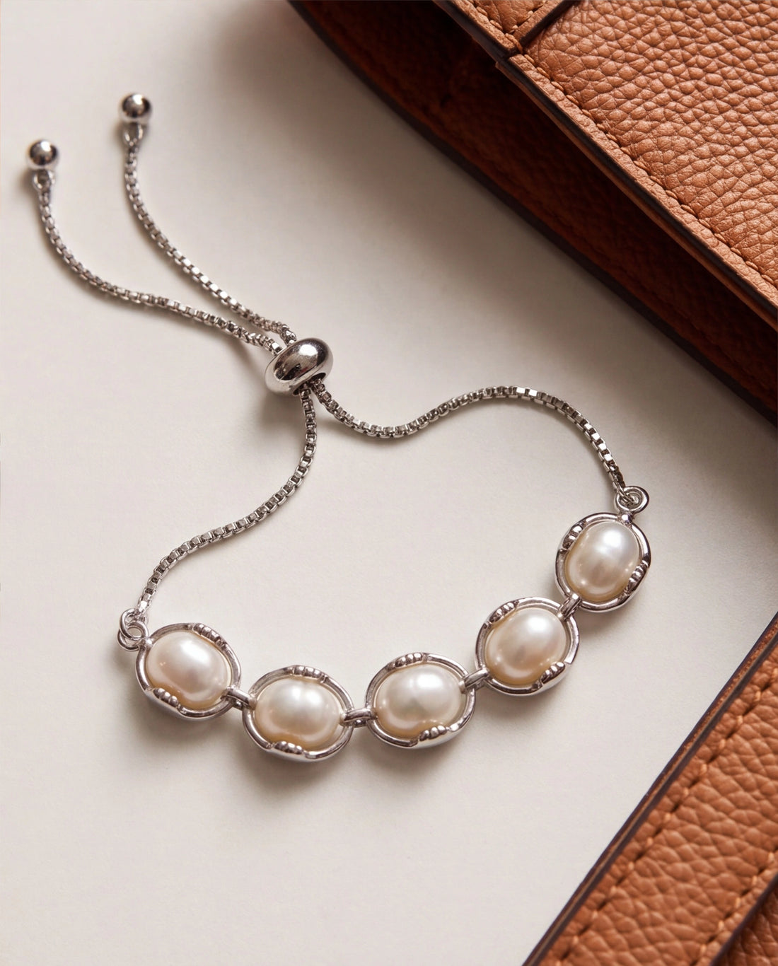 Silver-Plated Ring-Encased Pearl Bolo Bracelet