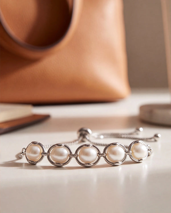 Silver-Plated Ring-Encased Pearl Bolo Bracelet