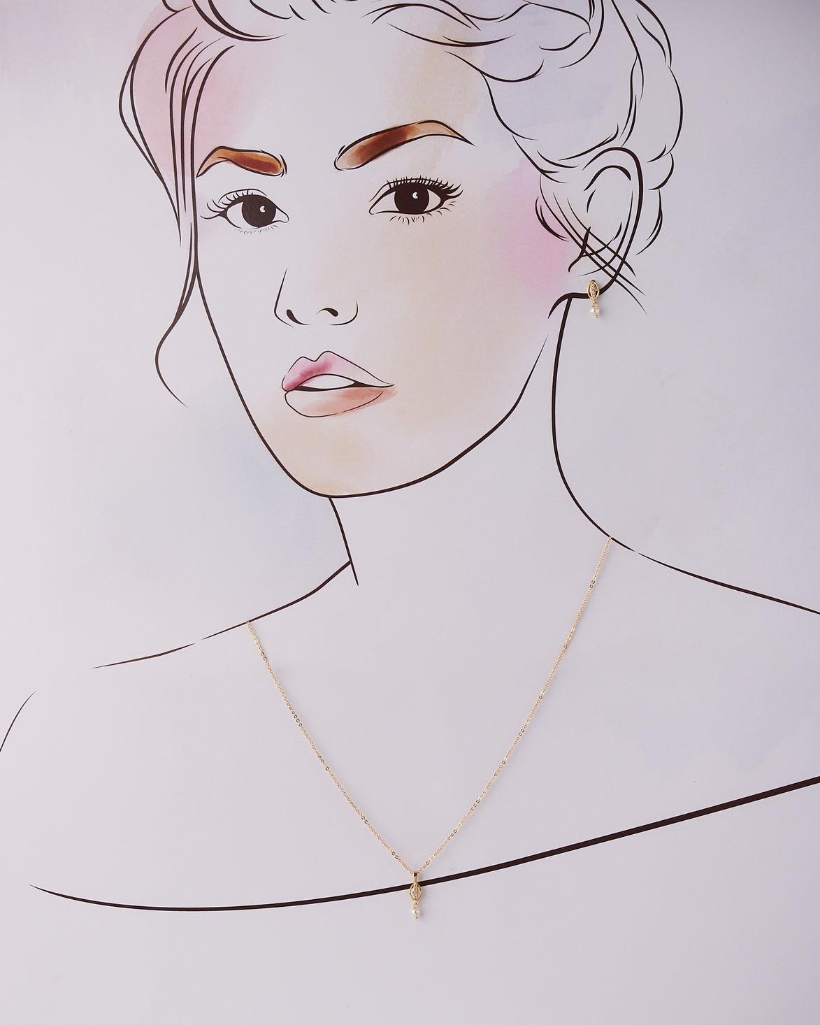 A cute pendant matched with golden polish chain with matching earrings. - Chandrani Pearls