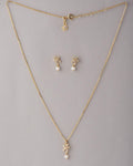 A cute pendant matched with golden polish chain with matching earrings. - Chandrani Pearls