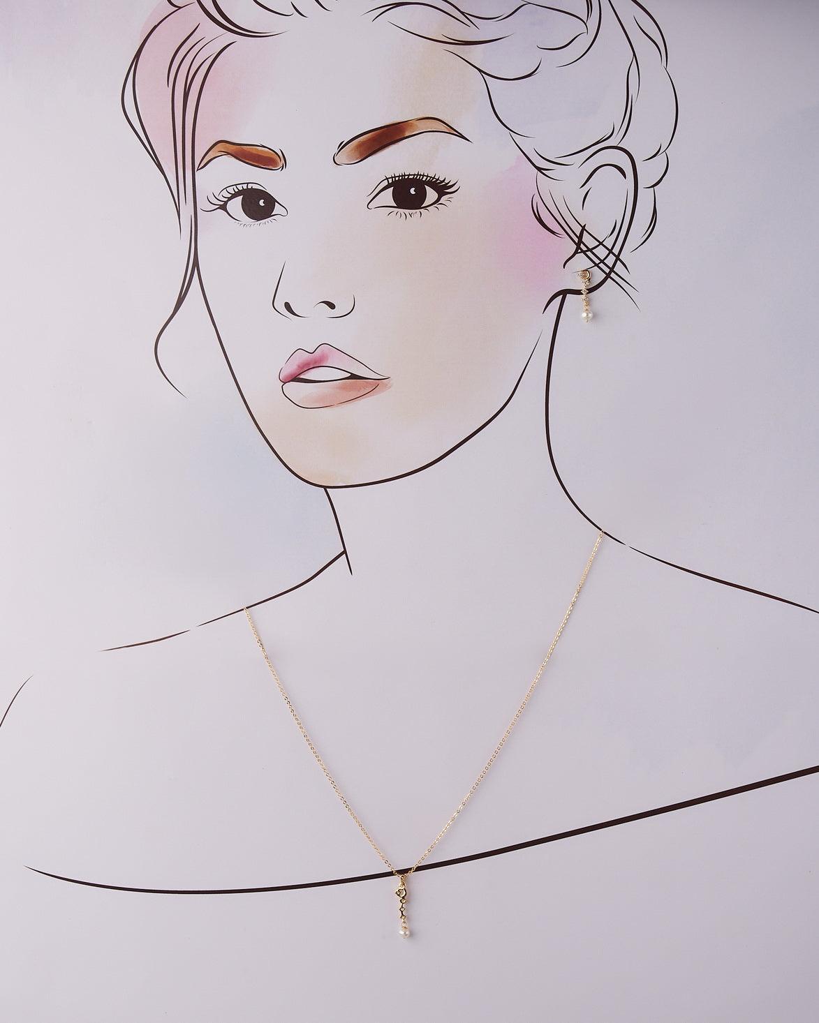 A cute pendant matched with golden polish chain with matching earrings. - Chandrani Pearls