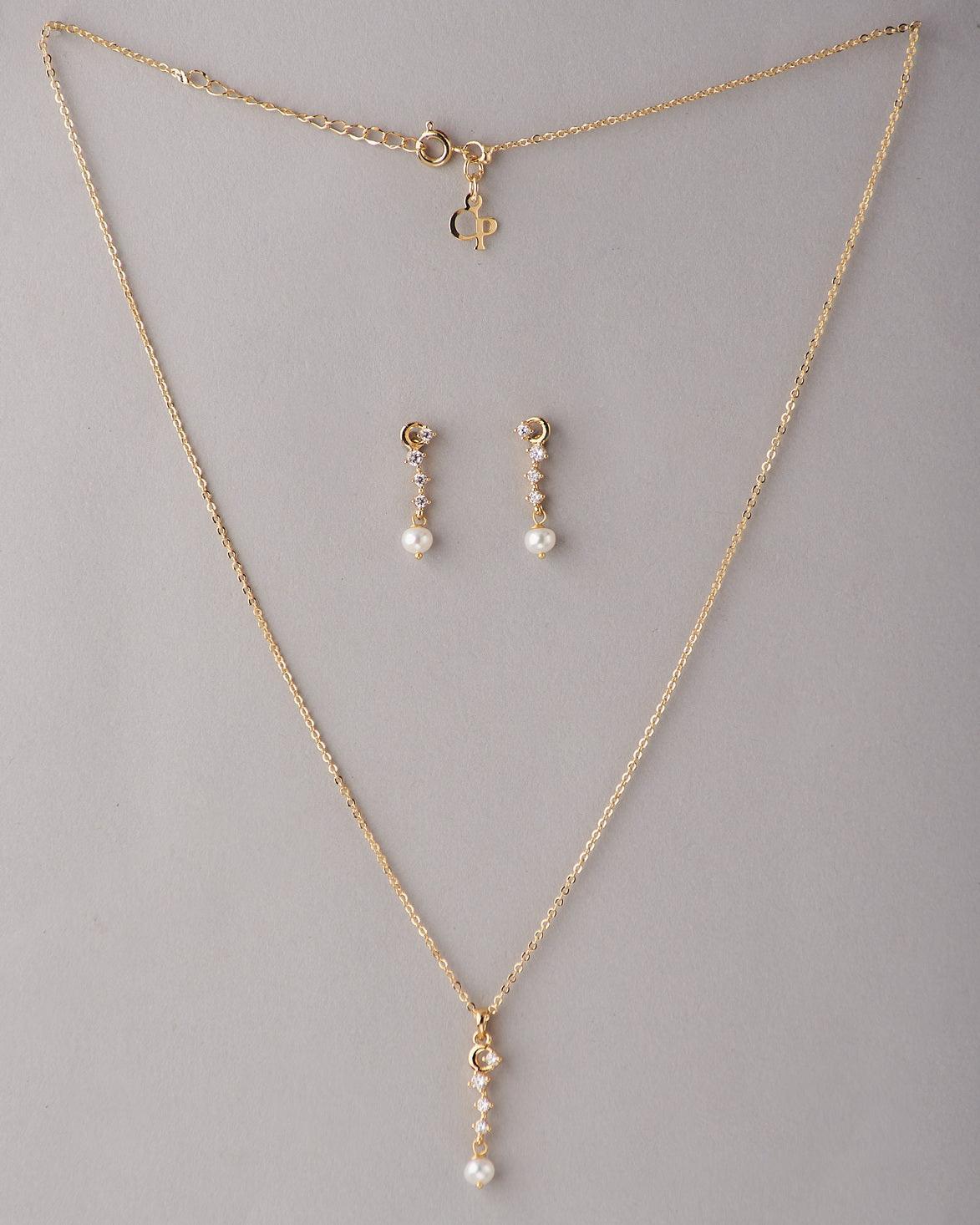 A cute pendant matched with golden polish chain with matching earrings. - Chandrani Pearls