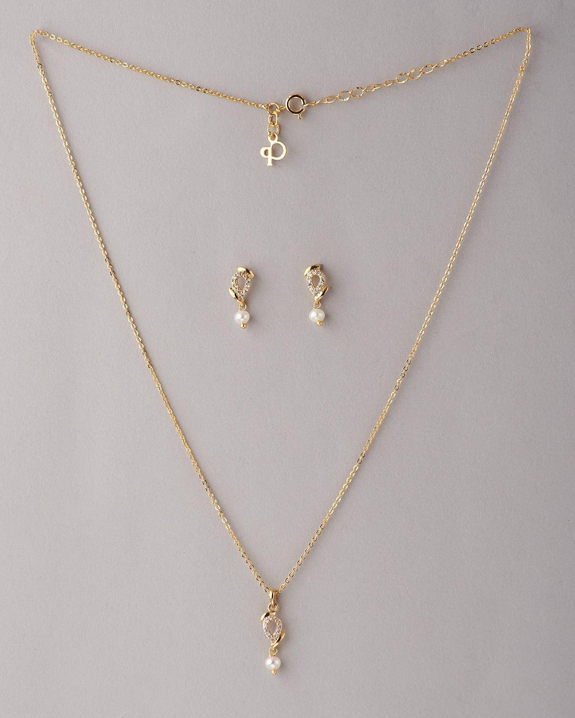 A cute pendant matched with golden polish chain with matching earrings. - Chandrani Pearls