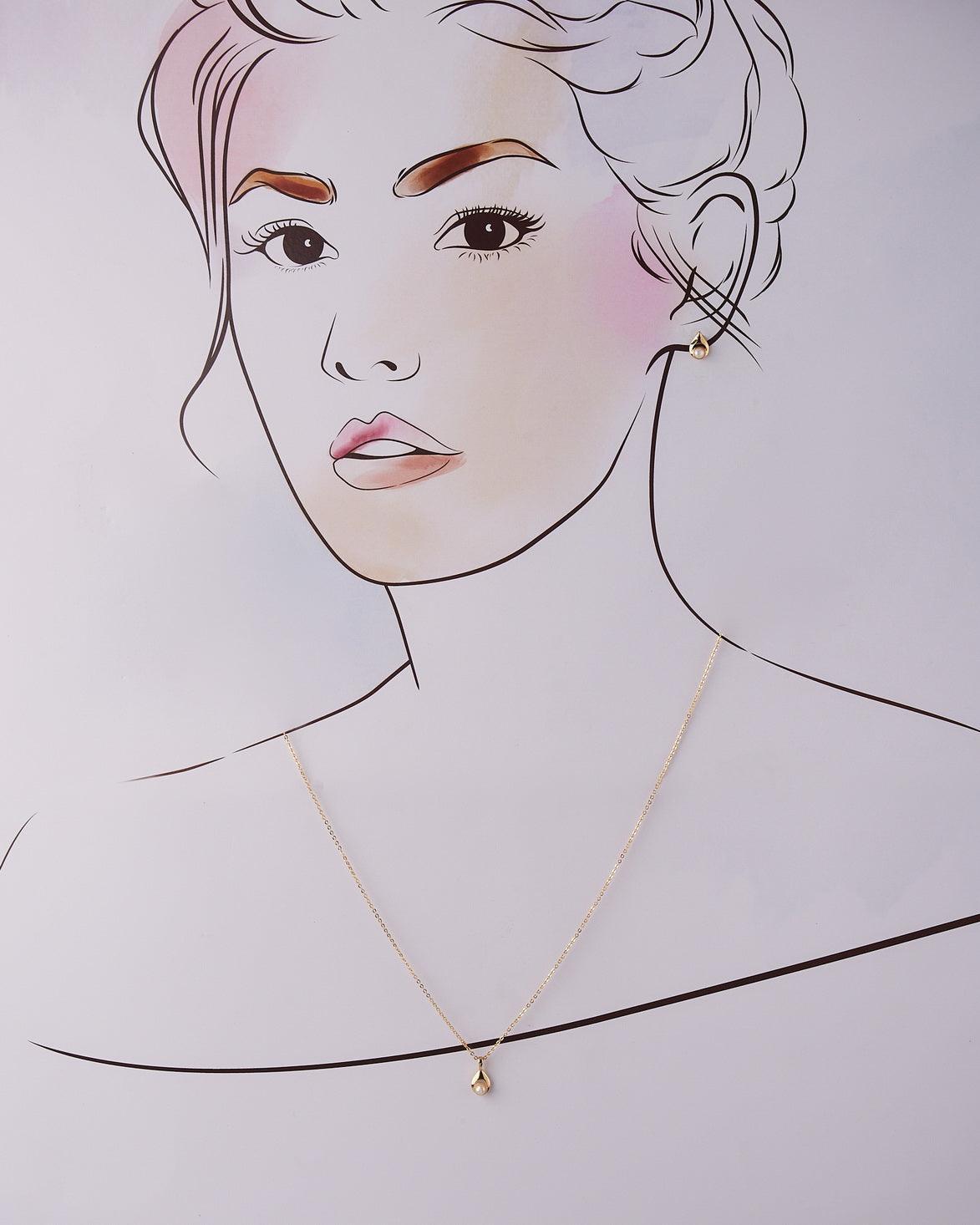 A cute pendant matched with golden polish chain with matching earrings. - Chandrani Pearls