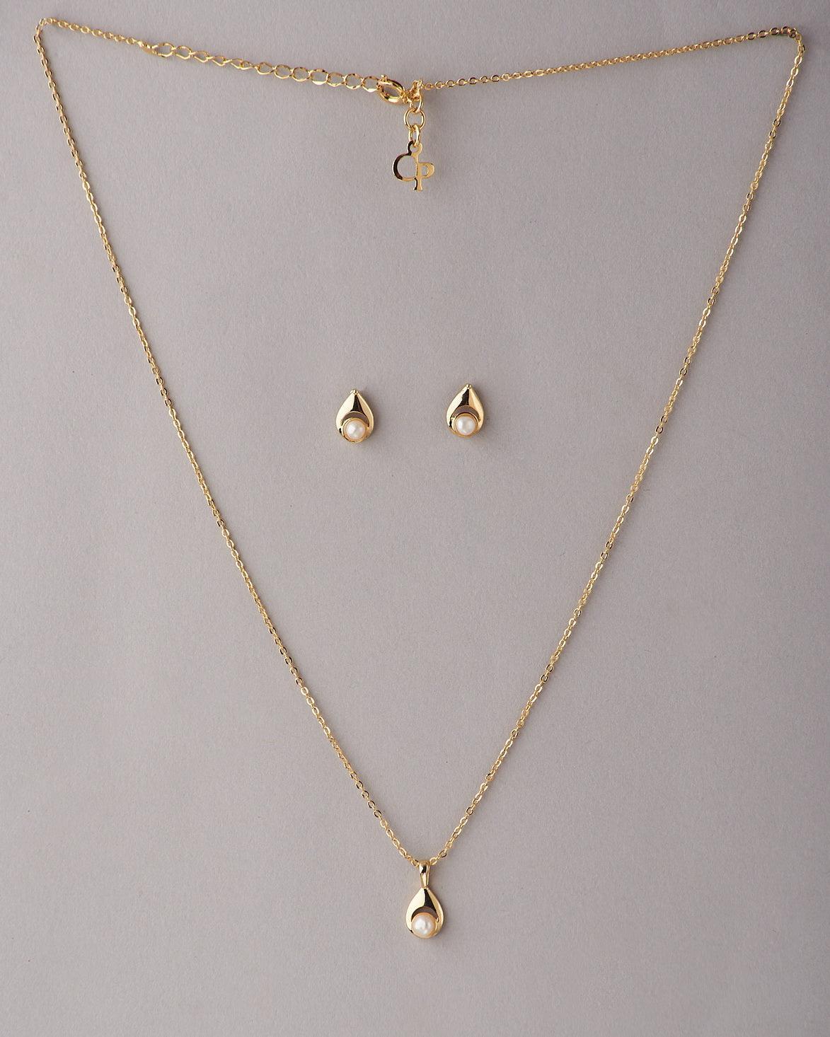 A cute pendant matched with golden polish chain with matching earrings. - Chandrani Pearls