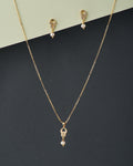 A cute pendant matched with golden polish chain with matching earrings. - Chandrani Pearls