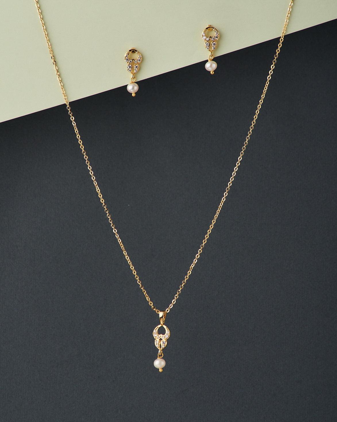 A cute pendant matched with golden polish chain with matching earrings. - Chandrani Pearls