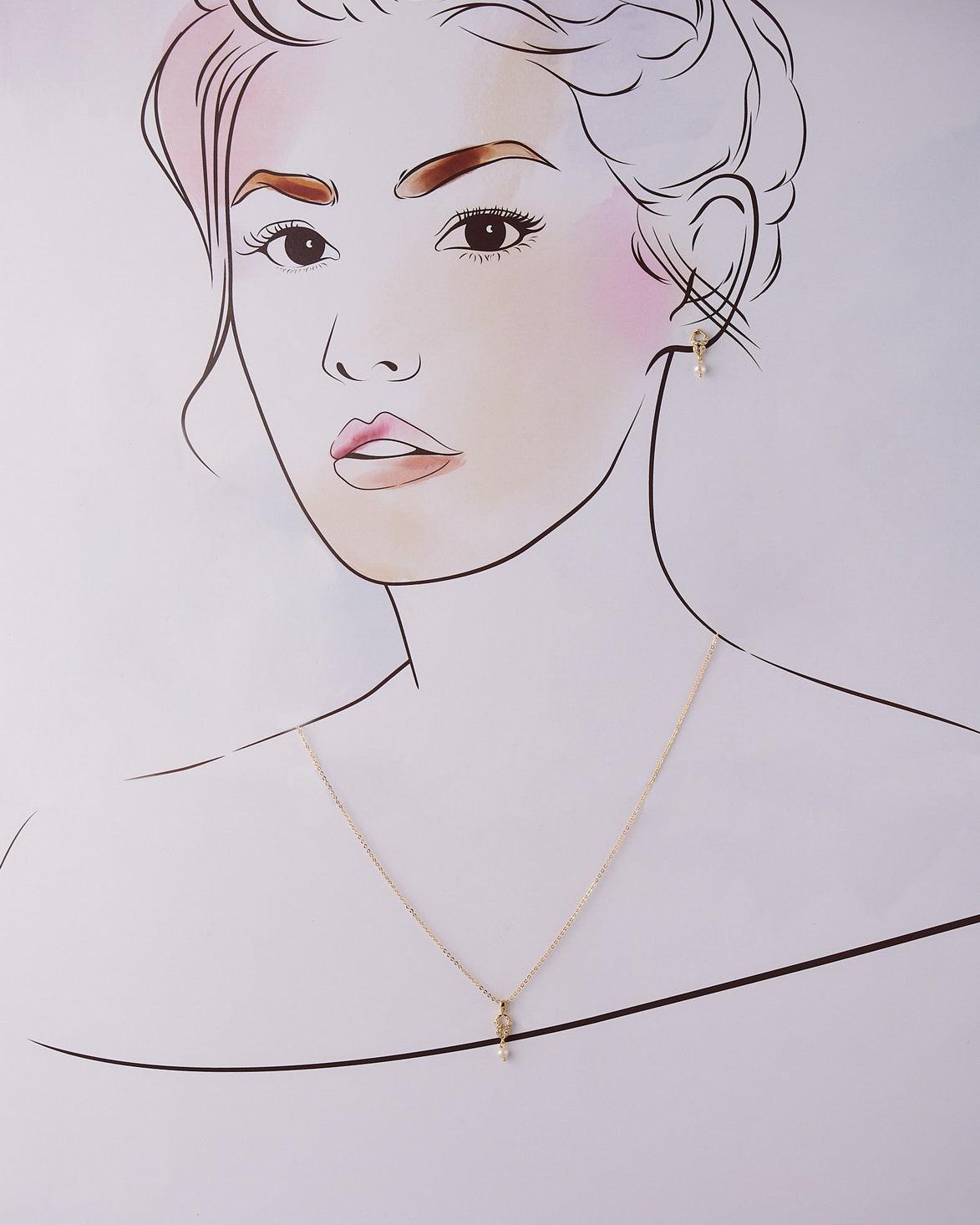 A cute pendant matched with golden polish chain with matching earrings. - Chandrani Pearls
