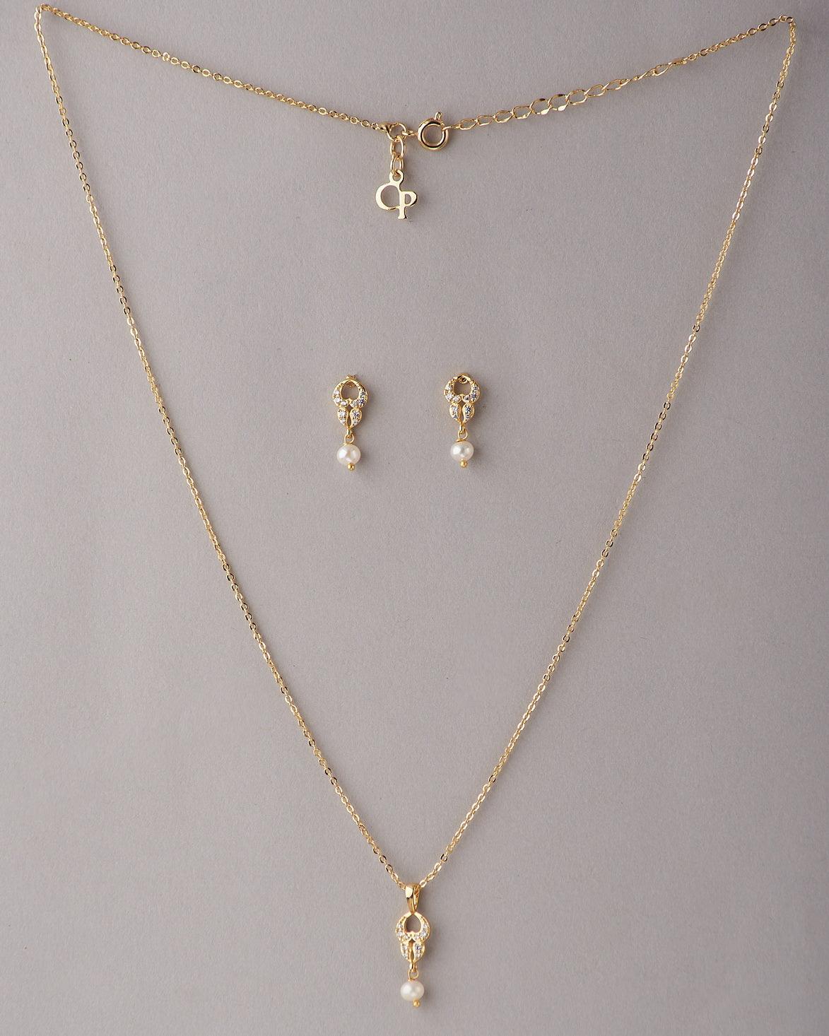 A cute pendant matched with golden polish chain with matching earrings. - Chandrani Pearls