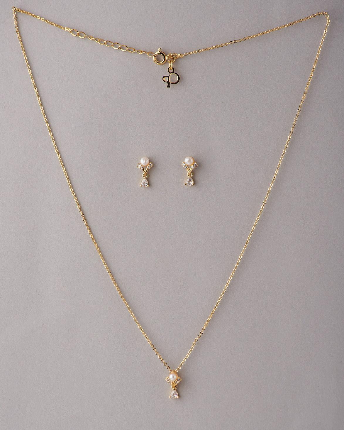 A cute pendant matched with golden polish chain with matching earrings. - Chandrani Pearls