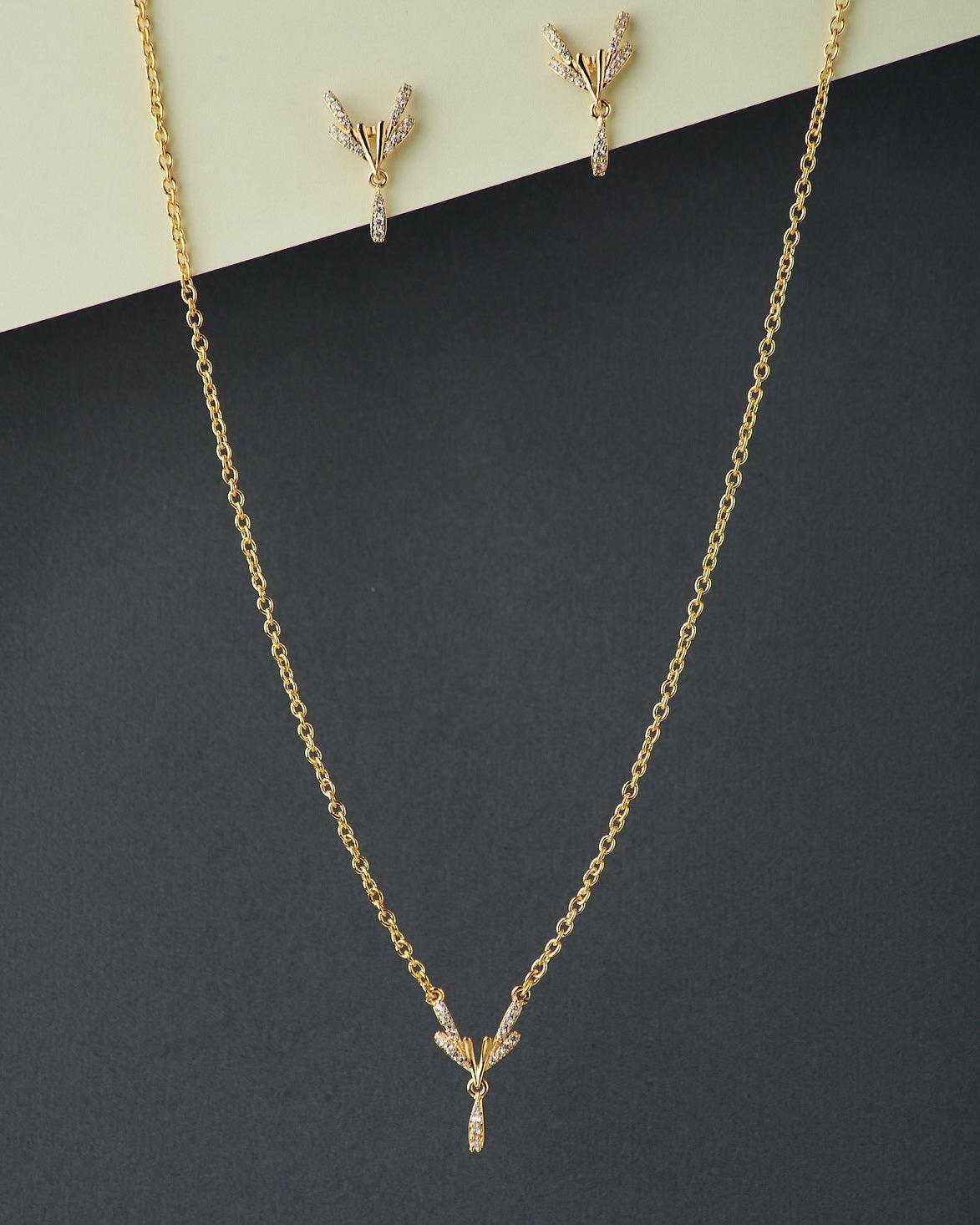 A cute pendant matched with golden polish chain with matching earrings. - Chandrani Pearls