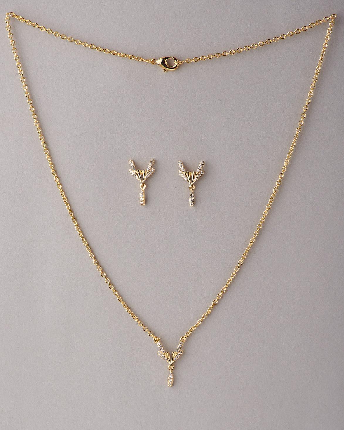 A cute pendant matched with golden polish chain with matching earrings. - Chandrani Pearls