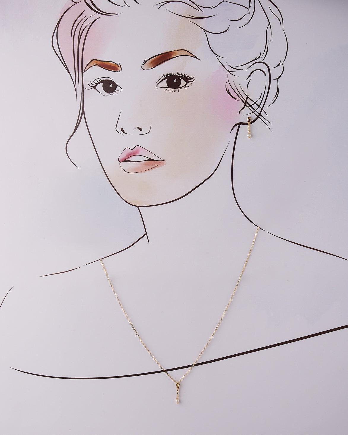 A cute pendant matched with golden polish chain with matching earrings. - Chandrani Pearls