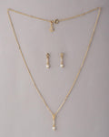 A cute pendant matched with golden polish chain with matching earrings. - Chandrani Pearls