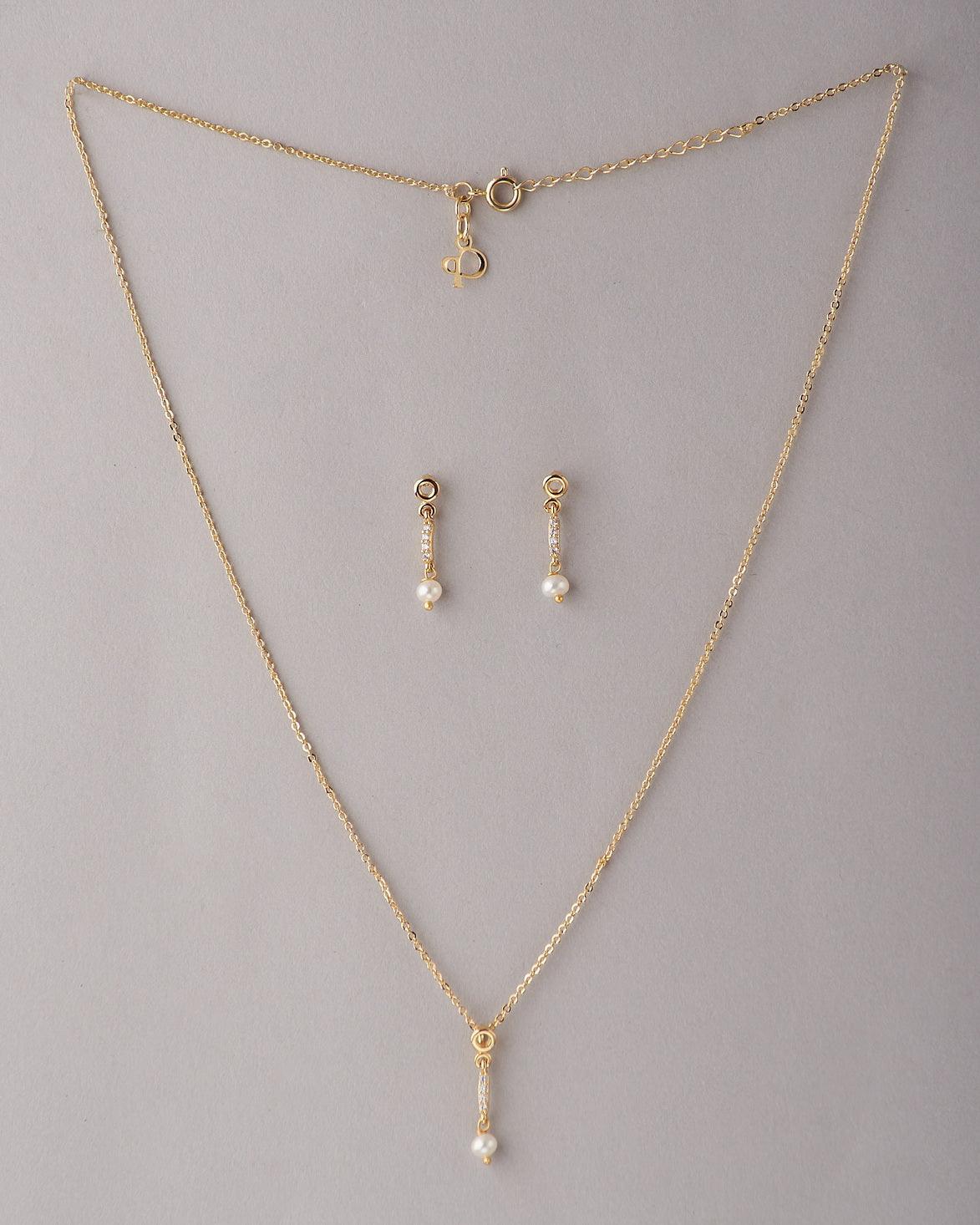 A cute pendant matched with golden polish chain with matching earrings. - Chandrani Pearls