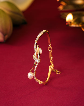 Elegant Curved Pearl Drop Bangle