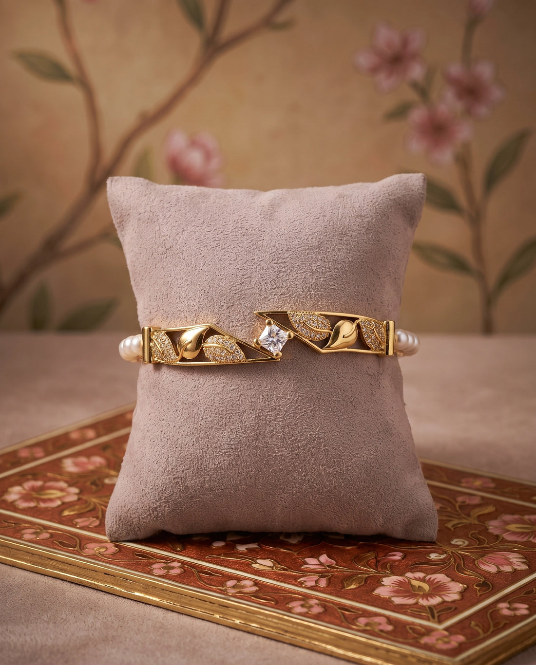 Gold Plated Pearl Bangle with Pavé Leaf & Solitaire CZ Canter