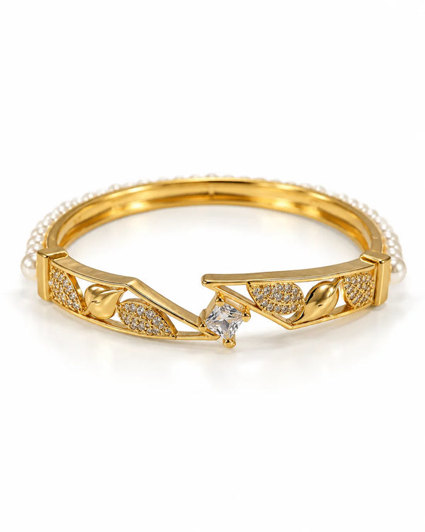 Gold Plated Pearl Bangle with Pavé Leaf & Solitaire CZ Canter