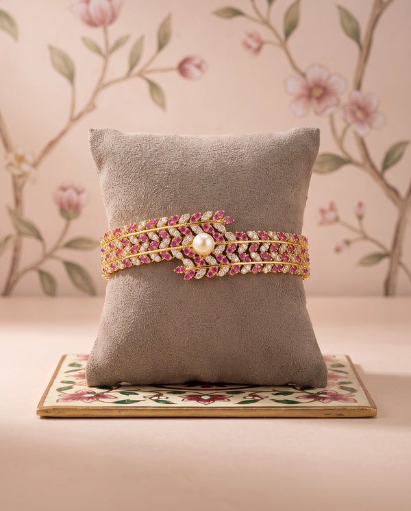 Ruby & CZ Gold Bangle Cum Bracelet with Solitaire Pearl Centrepiece