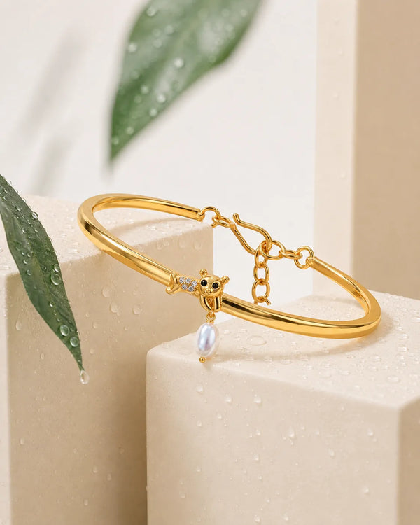 Gold-Plated Teddy Bear Bangle Bracelet with Pearl Drop & CZ Accents