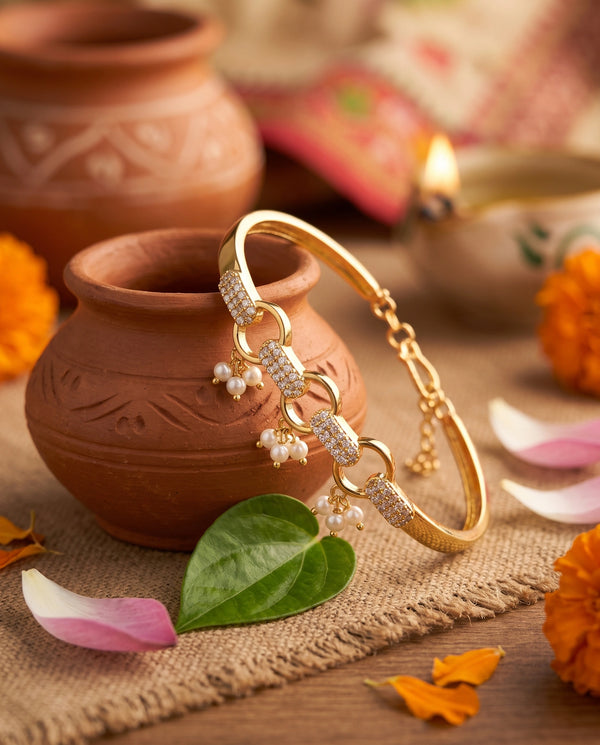 Gold-Plated Interlocking Circle Pearl Bangle with CZ Accents