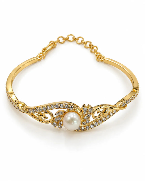 Gold-Tone Wave Bangle with Solitaire Pearl